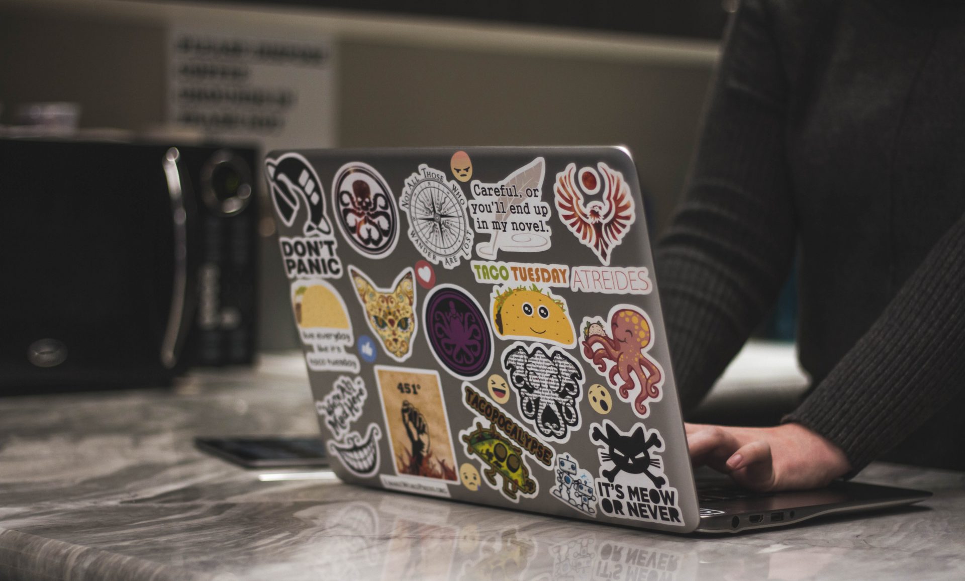 a man using online tools for collaboration whilst working from home
