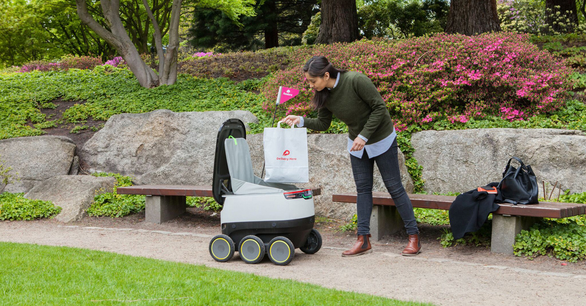 food delivery robot delivering food in a park